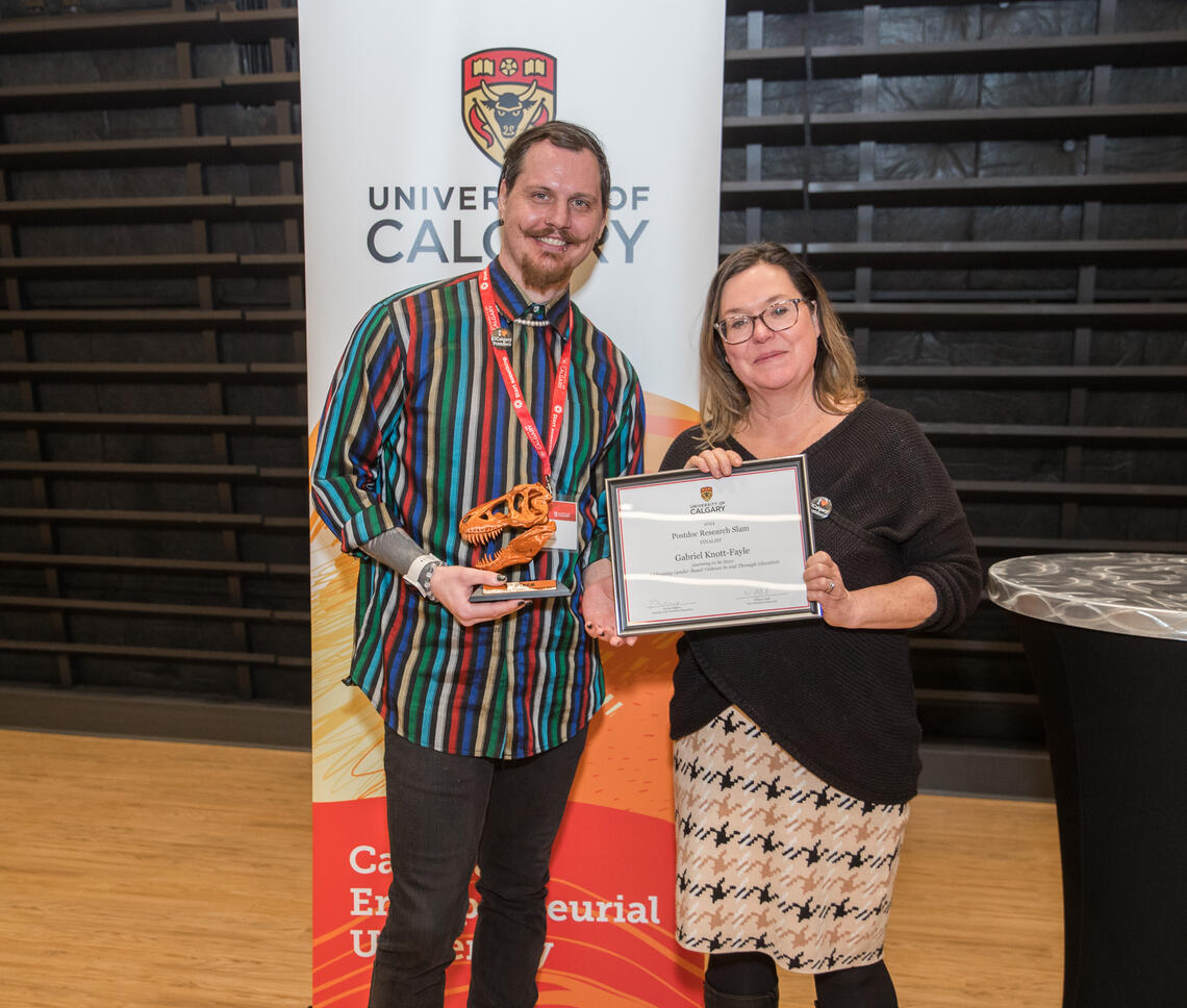 3rd place winner Dr. Gabriel Knott-Fayle with Dr. Katrina Milaney, Associate Vice-President (Research)