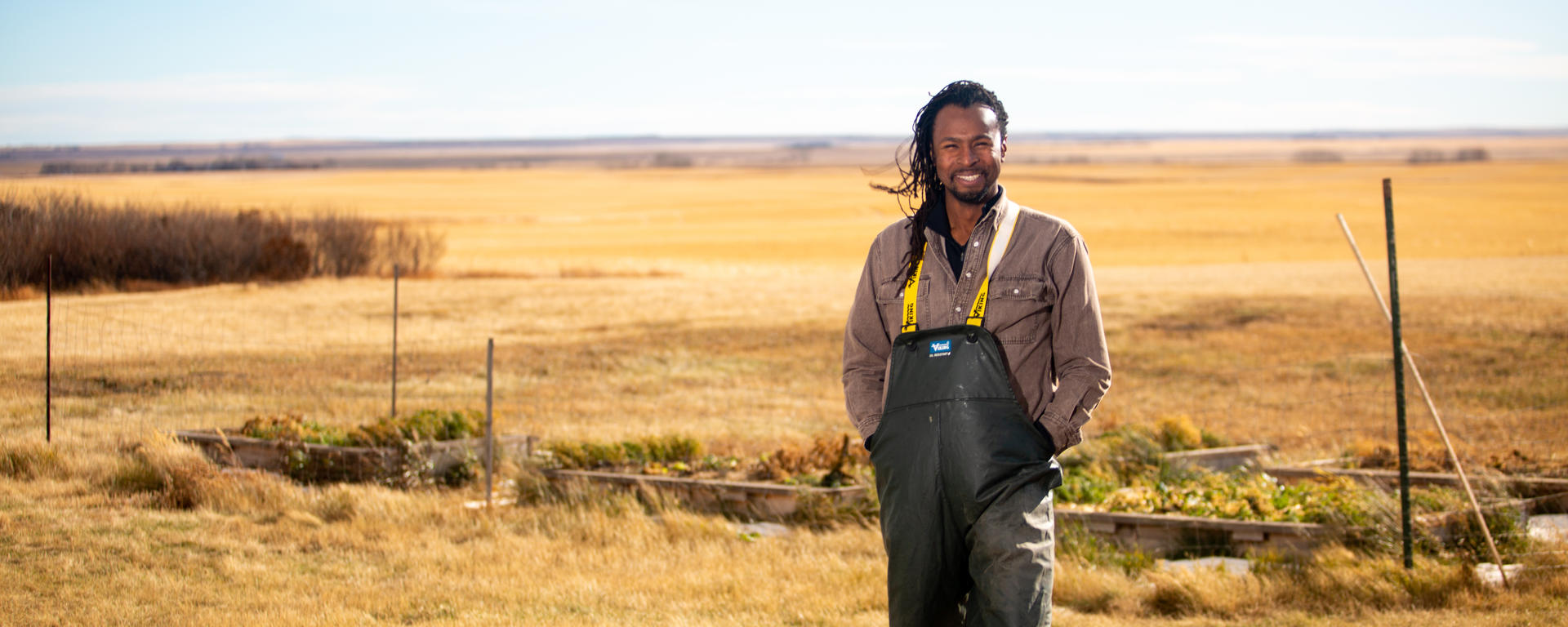 Researcher standing in a farm field