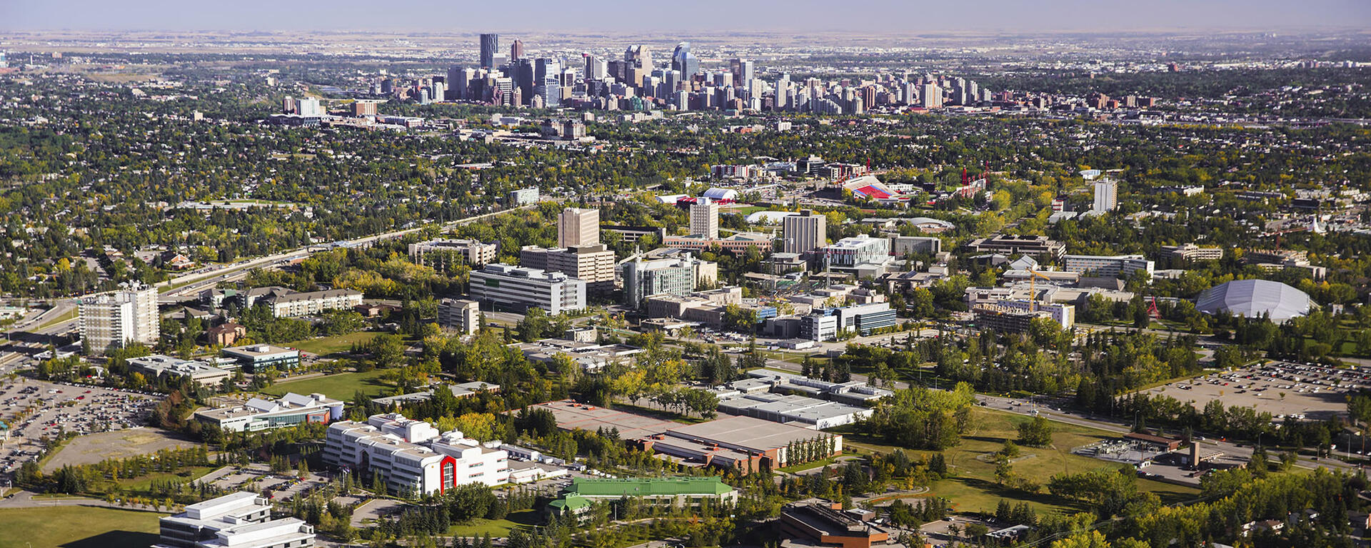University of Calgary aerial photo of campus with Downtown Calgary in the background