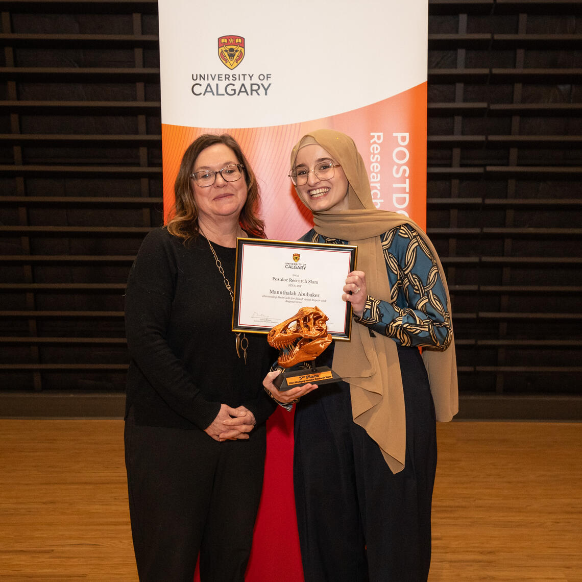 3rd place winner Dr. Mannthalah Abubaker with Dr. Katrina Milaney, Associate Vice-President (Research)