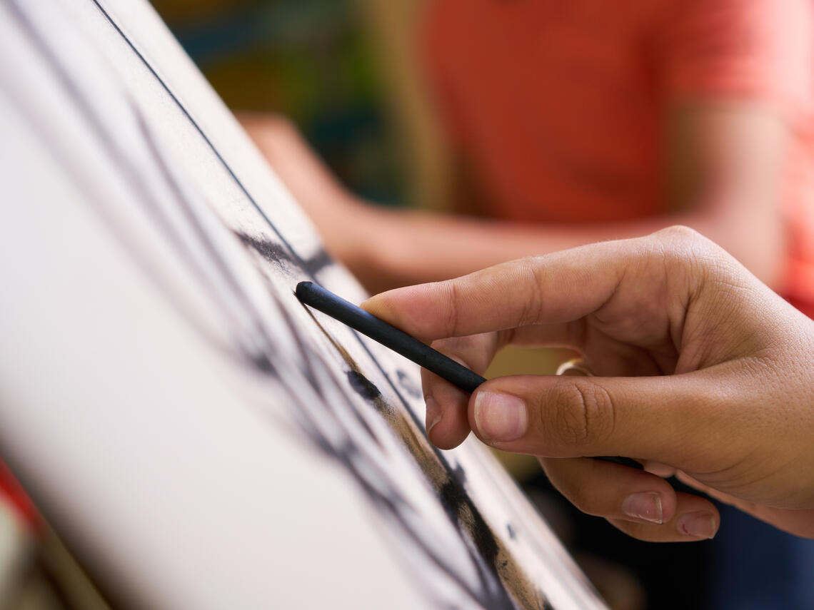 Hand drawing a portrait 