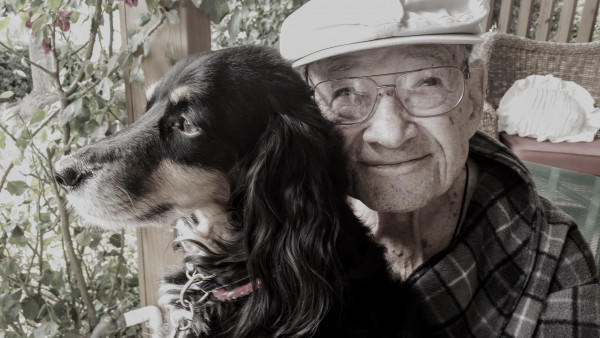 Elderly man and dog