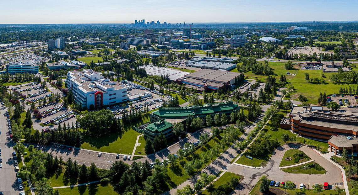 Aerial image of the University of Calgary campus, with downtown Calgary in the background