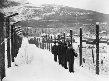 Guards on five-man-patrol at prisoner of war camp, Kananaskis, Alberta (1939). 
