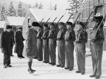 Inspection of guards at prisoner of war camp, Kananaskis, Alberta (1939-1940).