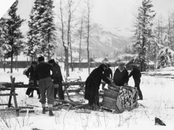 Prisoners cutting wood at prisoner of war camp, Kananaskis, Alberta (1939)