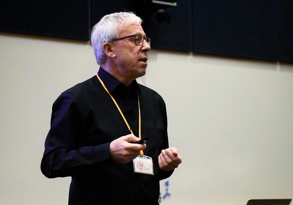 Dr. Peter Zoller delivering a lecture