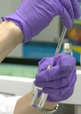 Researcher testing water samples