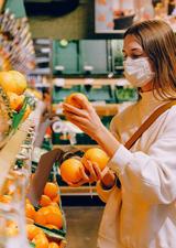 Person with a mask in a grocery store
