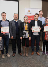 UCalgary Students posing with their awards
