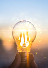 lightbulb with the sunset background